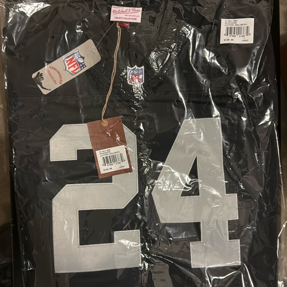 Authentic charles Woodson mitchell and ness jersey